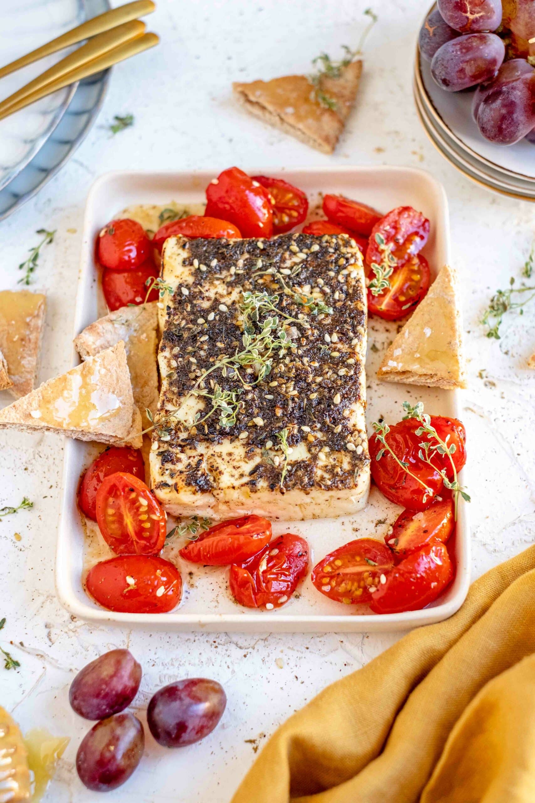 Baked feta with tomatoes and crackers