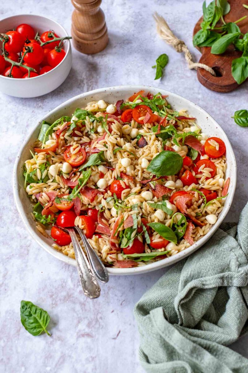 dressed caprese pasta salad with prosciutto